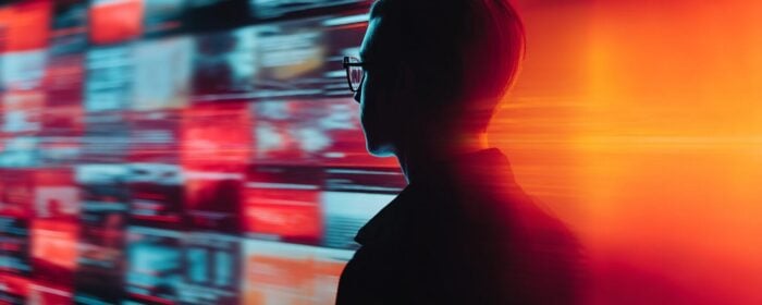 Person_surrounded_by_floating_vertical_holograph_25808799-86b7-4610-a244-a4ff3ecc814a_1 (1)